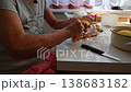 Woman cutting and preparing vegetables at home in the kitchen. Concept for cooking and food preparation. 138683182