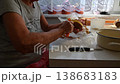 Woman cutting and preparing vegetables at home in the kitchen. Concept for cooking and food preparation. 138683183