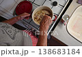Woman cutting and preparing vegetables at home in the kitchen. Concept for cooking and food preparation. 138683184