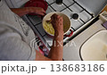 Woman cutting and preparing vegetables at home in the kitchen. Concept for cooking and food preparation. 138683186