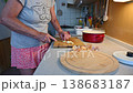 Woman cutting and preparing vegetables at home in the kitchen. Concept for cooking and food preparation. 138683187