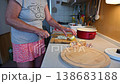 Woman cutting and preparing vegetables at home in the kitchen. Concept for cooking and food preparation. 138683188