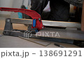 Master Finalizing Tile Cutter Adjustment 138691291