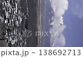 A time-lapse video (vertical, zoomed in) of the snow-covered town and Mt. Fuji as seen from a hilltop in Yamanakako Village. 138692713