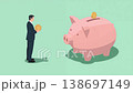 A Japanese man is trying to put a coin into a giant piggy bank against a mint background 138697149