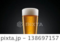 A sophisticated, minimalist background for pouring beer, showcasing its clarity and perfectly formed foam in an editorial setting. 138697157