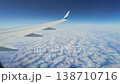 Above the world, a metallic wing glides peacefully, stirring dreams of exploration. 138710716