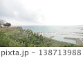 Chinen Cape Park under a cloudy sky and rough seas. 138713988