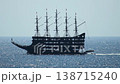 Big pirate-themed tour vessel legend with multiple masts cruises on sparkling blue ocean water under clear sky, silhouette against bright horizon, vessel for tourism and adventure in Turkey Alanya 138715240