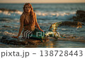 A beautiful mermaid sits gracefully on rocky shores as the sun sets, her shimmering green tail glistening. The serene ocean waves lap around her, creating a magical atmosphere filled with wonder. 138728443