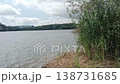 Calm lake landscape with cloudy sky and forest hills, natural scenery 138731685