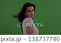 Hair Care And Beauty Concept Woman Tossing Long Brown Hair In Slow Motion On Green Screen For 138737780