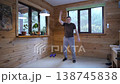 Man doing fitness training at home in wooden interior 138745838