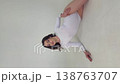 Graceful Woman in White Leotard Posing 138763707