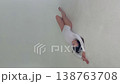 Graceful Woman in White Leotard Posing 138763708
