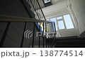 Wide window brightens every level of residential staircase 138774514