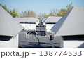Building roof features dark dense non-slip material covering 138774533