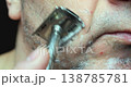 Man Shaving Close Up With Single Blade Reusable Razor 138785781