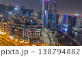 Glowing skyscrapers and canal in Dubai Business Bay all night time-lapse 138794882