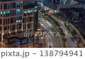 Low-rise office buildings and traffic in Dubai Bay Square night time-lapse 138794941
