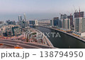 Skyscrapers and Dubai canal day to night transition aerial time-lapse 138794950