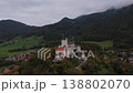 Drone flight shows Hohenaschau Castle in foggy Chiemgau. Schloss Hohenaschau, Bayern, Nebel ueber Alpen, Kampenwand, Laubenstein.  138802070