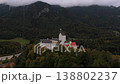 Cloudy drone footage, Hohenaschau Castle, misty forest. Schloss Hohenaschau, Bayern, Kampenwand, Nebel im Herbst. Drone video, Schloss Hohenaschau, fog in valley. Nebel ueber Priental, Kampenwand.  138802237