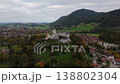Hohenaschau Castle in Bavaria, Germany, seen from the air, mist rolling through mountains, autumn trees glowing, historic fortress in Chiemgau valley view 138802304