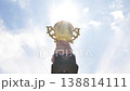Victory Shines Brightly. Lavish Award Raised High Amid Radiant Light And Festivity Celebration 138814111