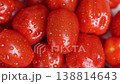 Vivid Depiction Of Rotating Cherry Tomatoes With Water Droplets Indicating Freshness And Purity 138814643