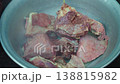 Chef Places Large Pieces of Cooked Meat for Pilaf into Aluminum Bowl 138815982