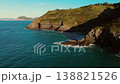 Aerial drone view of Cantabrian coastline with cliffs, green hills and ocean waves. Scenic coastal 138821526