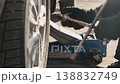 Mechanic Loosening Car Wheel Lug Nuts with Wrench 138832749