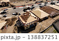 Aerial Orbit of a Busy Residential Housing Construction Site with Building Development Activity. 138837251