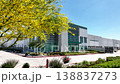 Dolly Right Shot of Modern Industrial Commercial Warehouse Building Exterior. 138837273