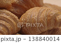 Fresh croissants baked in a cozy kitchen environment 138840014