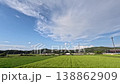 A time-lapse of clouds. Green rice fields, blue sky, white clouds. 138862909