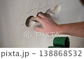 Electrician Installing Wall Socket Boxes During Interior Renovation 138868532