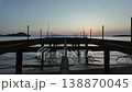 Cinematic Sunset Timelapse from the Top of an Abandoned and Dismantled Rusty Iron Pier on a Coastline 138870045