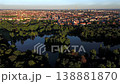 Aerial panorama of Munichs English Garden with Kleinhesseloher See and islands. Popular holiday attraction in Germany. Green parkland, water, forest and heritage site in Bavaria.  138881870