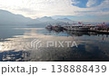 Sun Moon Lake Pier with Boats and Mountain Reflection at Sunrise in Taiwan 138888439