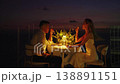 Romantic couple enjoying a candlelight dinner at sunset 138891151