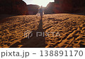 Woman running in the desert of AlUla, Saudi Arabia. 138891170