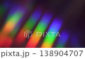 Abstract diagonal rainbow prism light reflections and iridescent colorful rays on a dark background 138904707