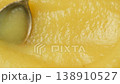 Close-up showing the smooth texture of fresh apple sauce. 138910527