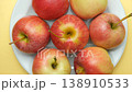 Ripe red apples on a yellow background top view rotation 138910533