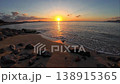 A calm beach at dusk 138915365