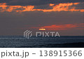 The sun on the horizon and a ship crossing it 138915366