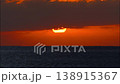 A ship crossing the sky at dusk. 138915367