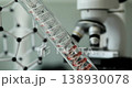 Red liquid flowing through sterile glass tube in laboratory 138930078